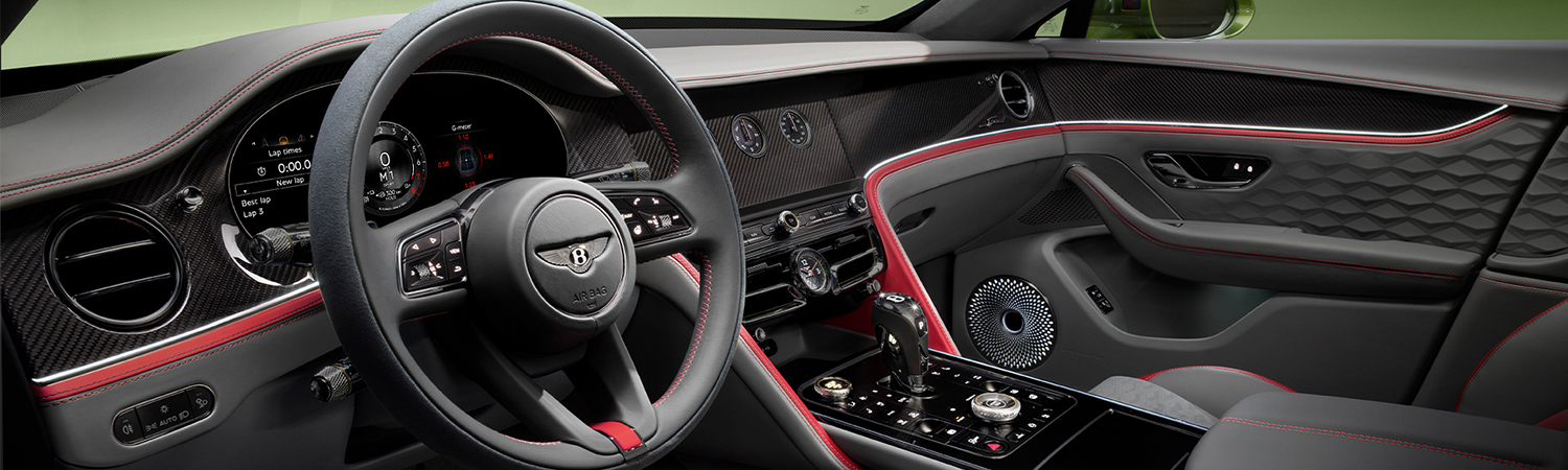 New Bentley Flying Spur Speed's front cabin with detailed contrast stitching and Speed Emblems