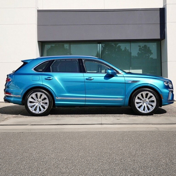 Side profile view of a Blue Bentley