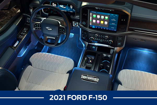 Overhead view of a 2021 Ford F-150 interior with ambient lighting in cool Ice Blue