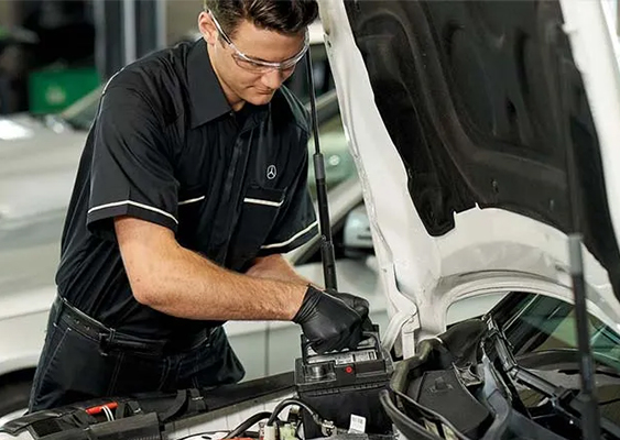 Service tech replacing a battery