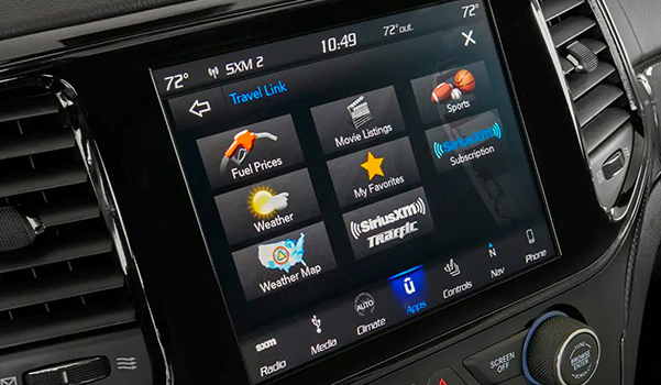A close-up of the touchscreen in the 2021 Jeep Grand Cherokee displaying the different SiriusXM app selections.