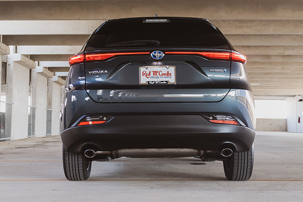rear viewof 2021 toyota venza parked in a multi floor parking lot